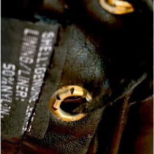 Ladies leather fringed riding vest with Harley Davidson broken wings patch.